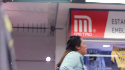 People walking through the corridors of the subway station. Stock Footage 77328895