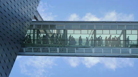 People walking through hallway. group team business company. glass building Stock Footage