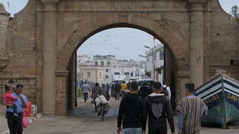 People walking through the Marrakech port exit, Morocco, Africa in 4K Stock Footage 93854650