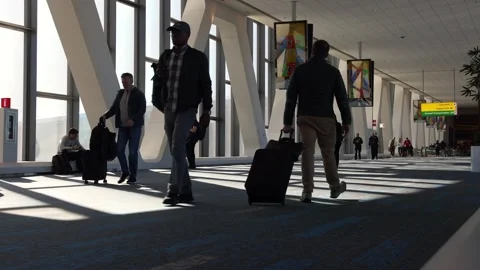 People walking through the new Delta Terminal C at Laguardia Airport (LGA) Stock Footage 296596525