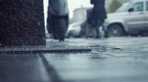 People walking through puddles Rain water flowing from downpipe Video stock 69034864