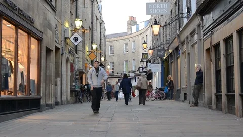 People walking through Rose Crescent past shops, Cambridge UK Stock Footage 87173011