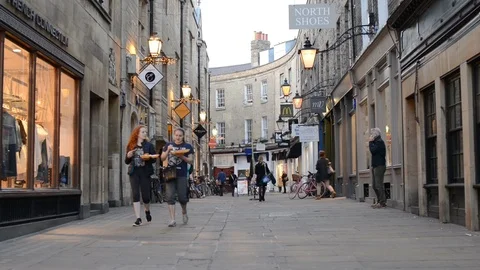 People walking through Rose Crescent past shops, Cambridge UK Stock Footage 87173138