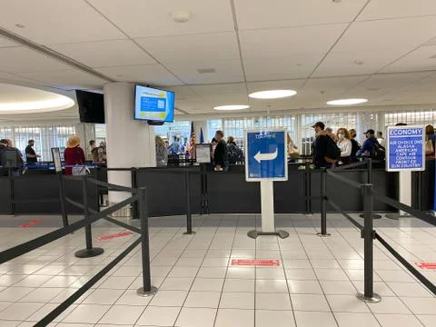 People walking through the security line at St. Louis, MO Lambert Internation Stock Photos