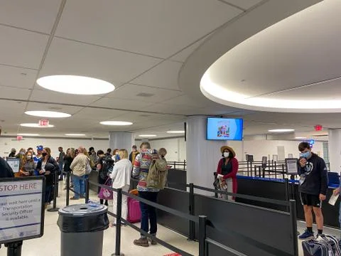 People walking through the security line at St. Louis, MO Lambert Internation Stock Photos