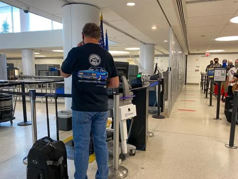 People walking through the security line at St. Louis, MO Lambert Internation Stock Photos