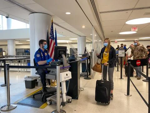 People walking through the security line at St. Louis, MO Lambert Internation Stock Photos