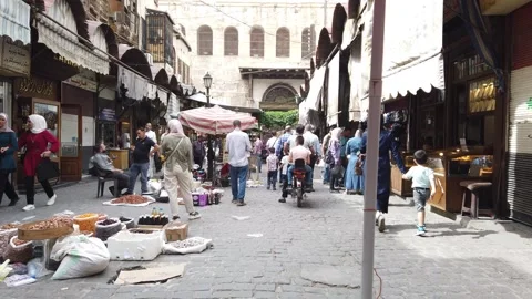 People walking through Suq in old city of Damascus, Syria Stock Footage 250313753