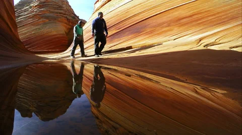 People walking through the Wave Stockbeeldmateriaal 54056543