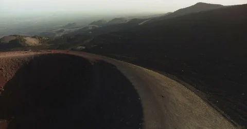 People walking on top of Mount Etna Stock Footage 77077928