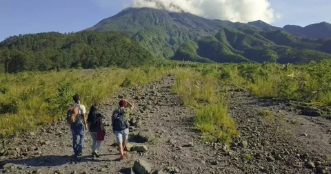 People Walking Toward Merapi Volcanic Mountain Yogyakarta Central Java Stock Footage 200806042