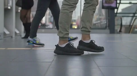 People walking in train station with baggage Stock Footage 68954411