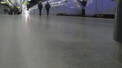 People walking in train station with baggage Stock Footage 68983858