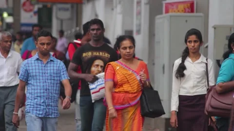 People walking trough the busy Street Video stock 156013553