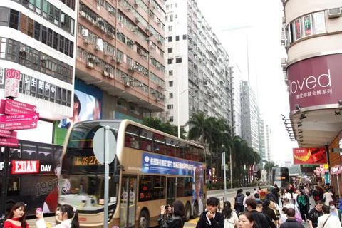 People walking at Tsim Sha Tsui street view. Stock Photos