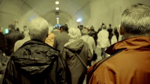 People walking in a tunnel Stock Footage 69855971