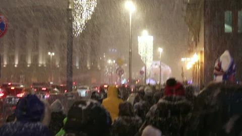 People walking under a heavy snowfall. Stock Footage 85797754