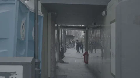 People walking under a man-built scaffolding Stock Footage 219267935