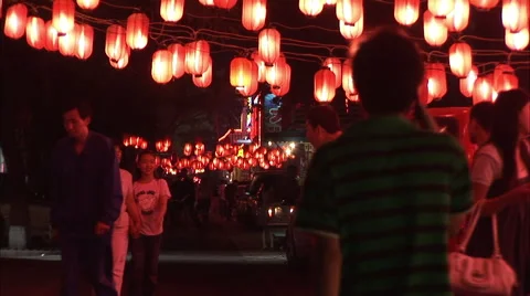 People walking under red lanterns, Beijing Stock Footage 56604535