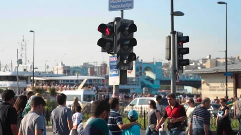 People is walking under traffic light Stock-Footage 133523793
