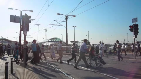 People is walking under traffic light in tram station Stock Footage 133525417