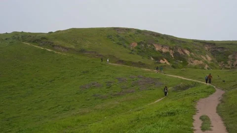People Walking on a Windy Day at Point Reyes Stock Footage 239601192