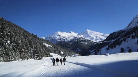 People walking in winter landscape Stock Footage 35183478