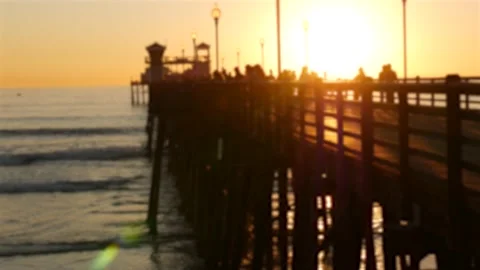 People walking, wooden pier in California USA. Oceanside waterfront vacations Stock Footage