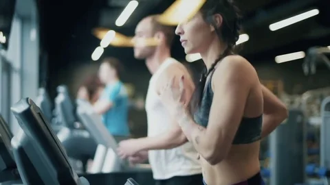 People warming up on treadmills  Stock-Footage 75672363