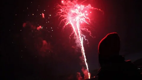 People watching fireworks at the beach Stock Footage