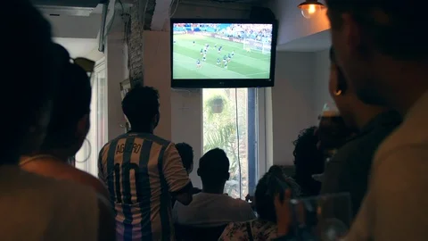 People watching a Football Game. Celebration of the Goal. Stock Footage