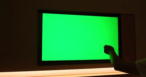 people watching large green screen TV at... | Stock Video | Pond5