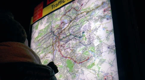 People watching the map of Prague at night Stock Footage 33956960