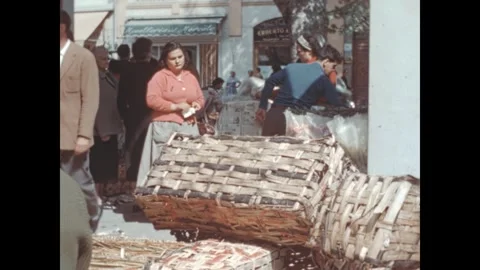 People watching a parade float in menton, france in 1958 Stock Footage 346215586