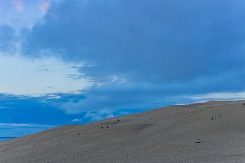 People watching the sunset on the dune Stock Photos