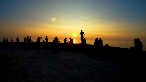 PEOPLE WATCHING THE SUNSET Stock Footage 94230268