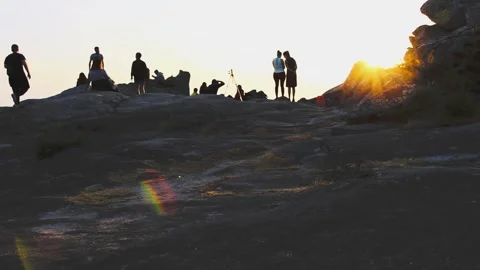 PEOPLE WATCHING THE SUNSET Stock Footage 94231059