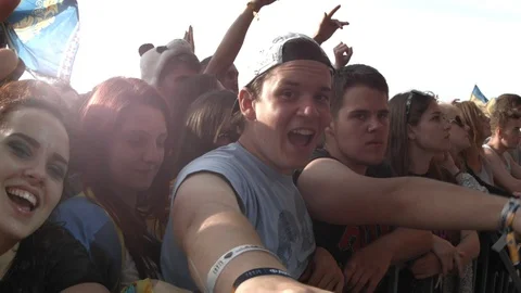 People Waving And Clapping Hands At Concert, Enjoying Music Stockbeeldmateriaal 89493083