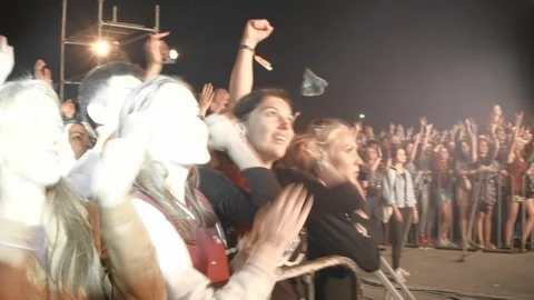 People Waving And Clapping Hands At Concert, Enjoying Music Stockbeeldmateriaal 89493669