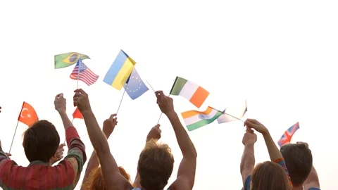 People waving different flags outdoors. Stock Footage 97836372