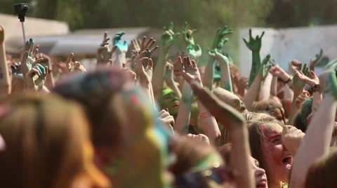People waving their hands in time to the music Stock Footage 64100155