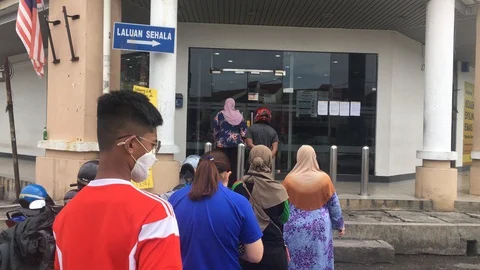 People wearing face mask queue Stock Footage 128384075
