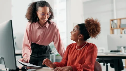 People, web designer and computer with paperwork, discussion and talking for Stock Footage 295141835