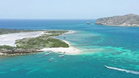 People on white beach of Isla Cabra or Goat island, Monte Cristi in 動画素材 196724374
