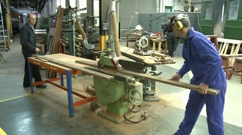 People Wood Cutting With Electric Saw in Factory/Workshop Stock Footage