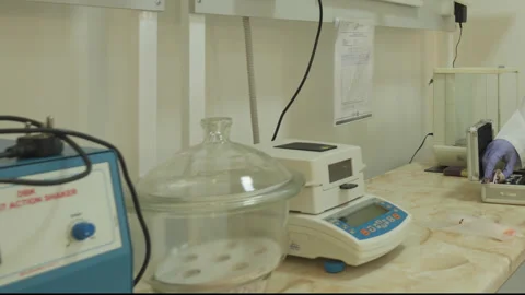 People work in a chemical laboratory. Protective clothing, equipment, bright Stock Footage 333449962