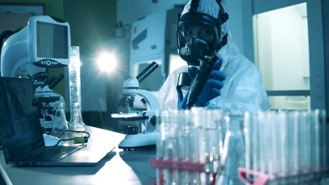 People work in laboratory with coronavirus tests. Covid19, coronavirus concept. Stock Footage 128839613