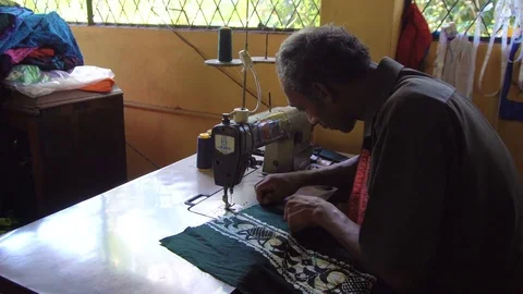 People at Work. Man Sewing Batik Textile at Factory, Sri Lanka - 10 February Stock Footage 73063649