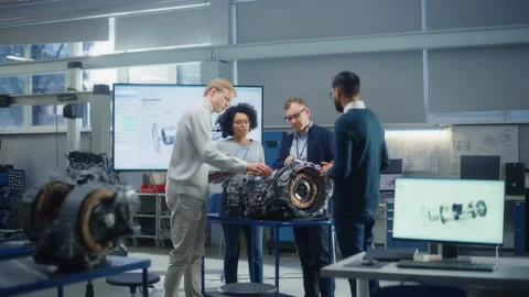 People Work Together With Electric Engine Stock Footage 189855257