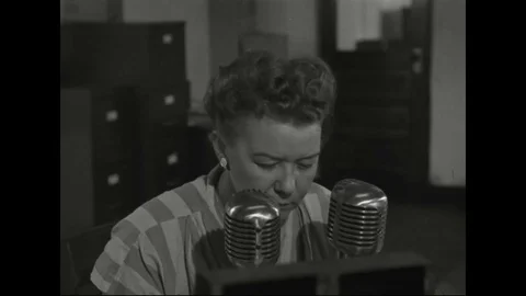 People working in communications hub or station relaying messages - 1940 Stock Footage 107129281